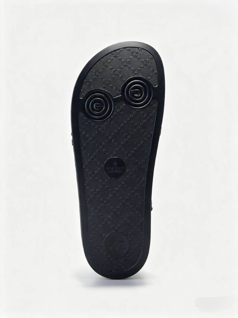 Gucci Interlocking GG Embossed Rubber Slides - Image 4
